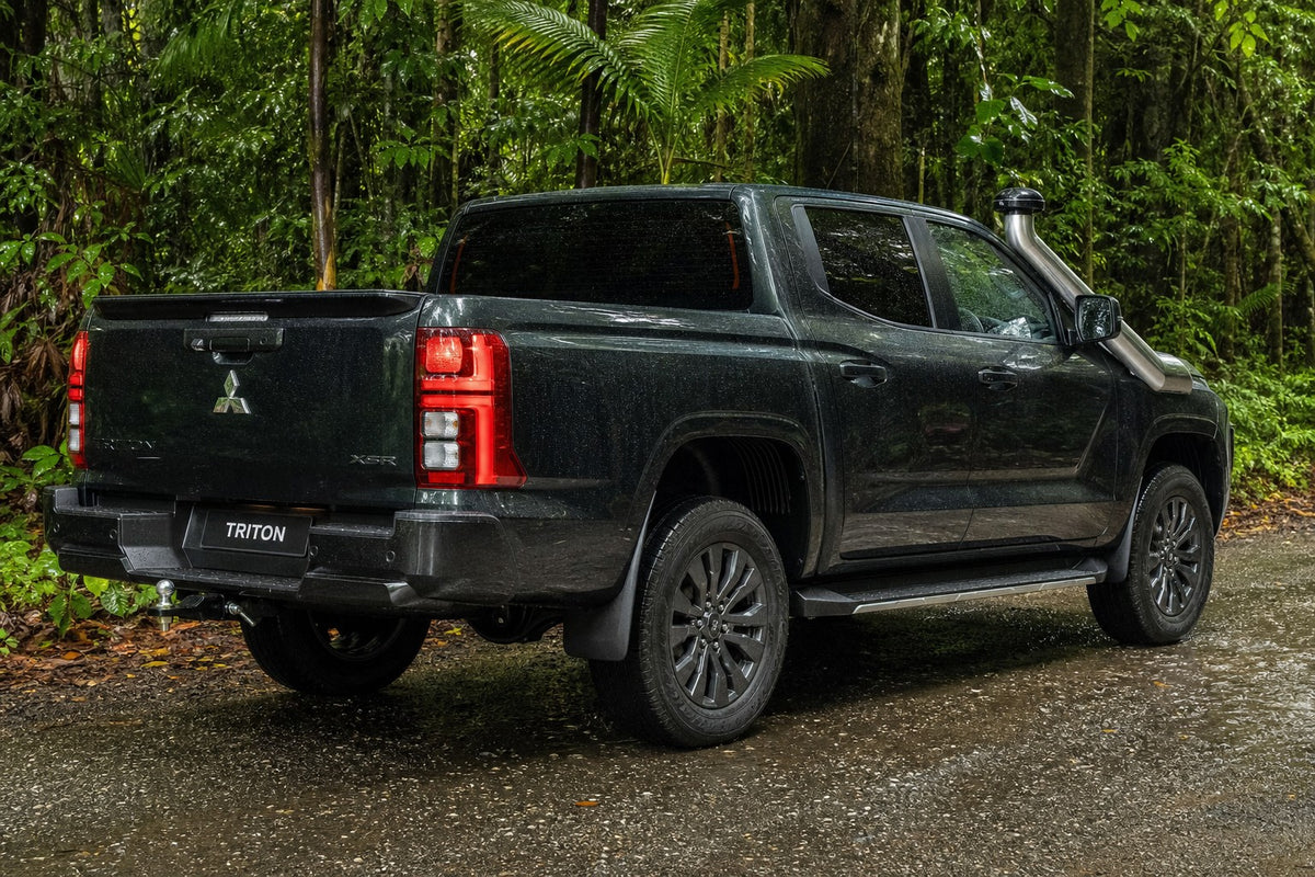 Dark green Mitsubishi Triton MV with stainless Roar 4x4 snorkel fitted