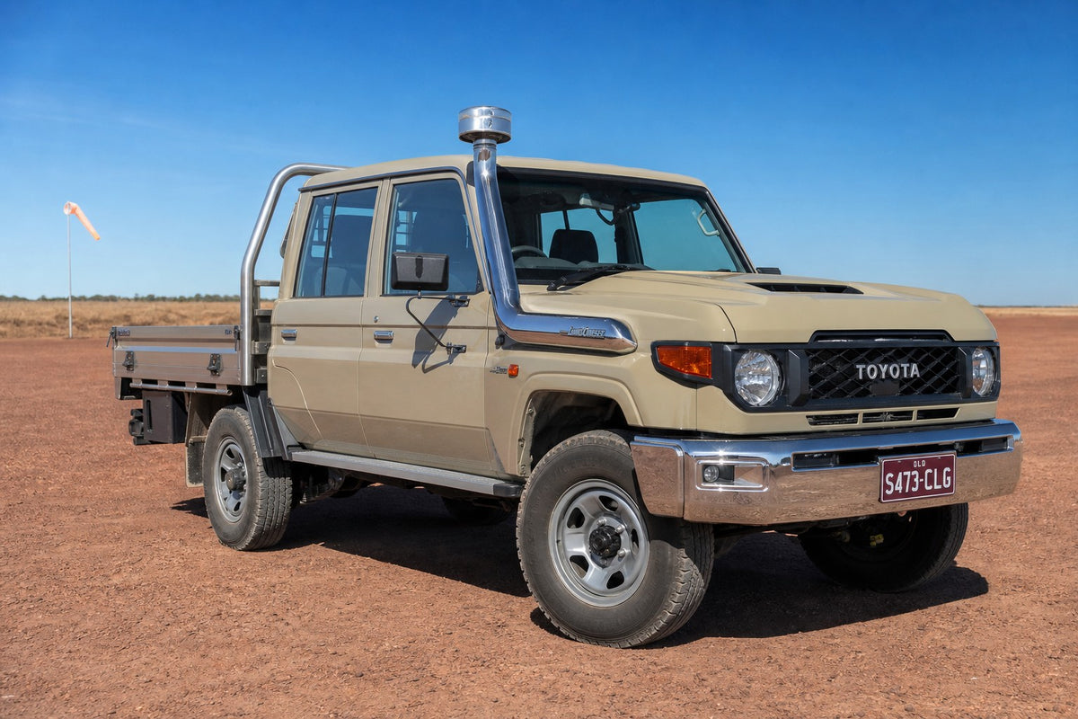 Sandy taupe LandCruiser 79 dual-cab with stainless Roar 4x4 snorkel fitted