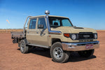 Sandy taupe LandCruiser 79 dual-cab with stainless Roar 4x4 snorkel fitted